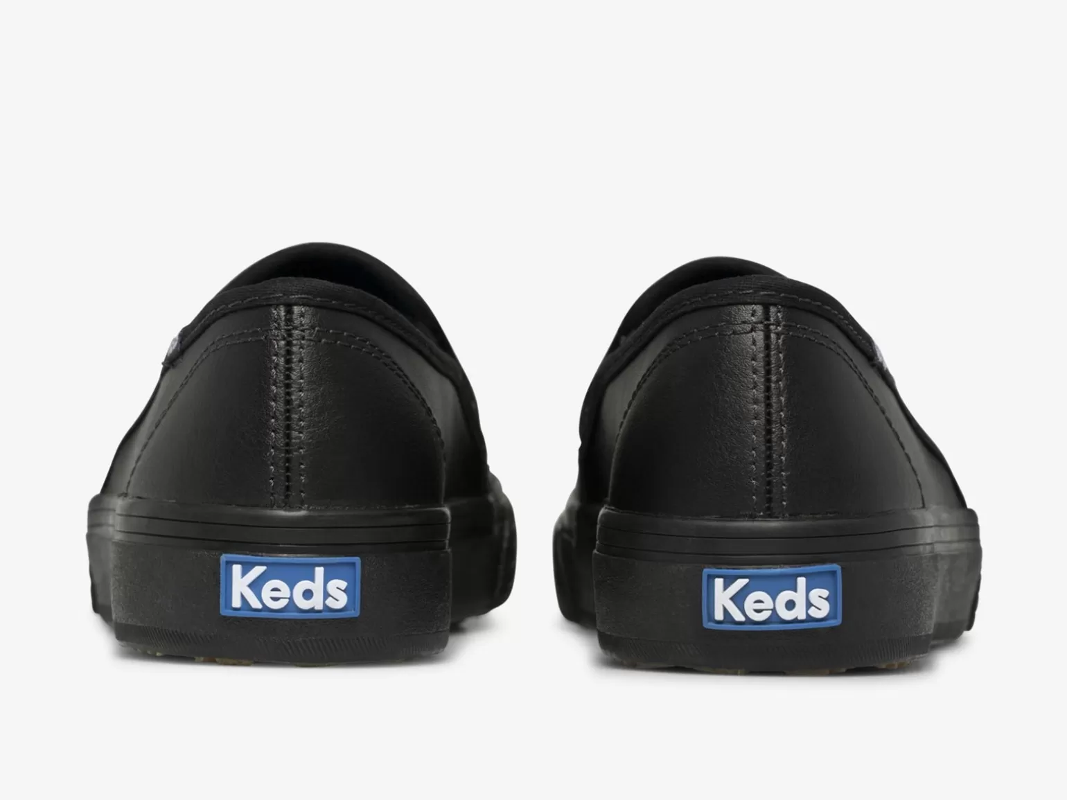 Keds Leather>Women's Double Decker Leather Slip On Sneaker Black Black