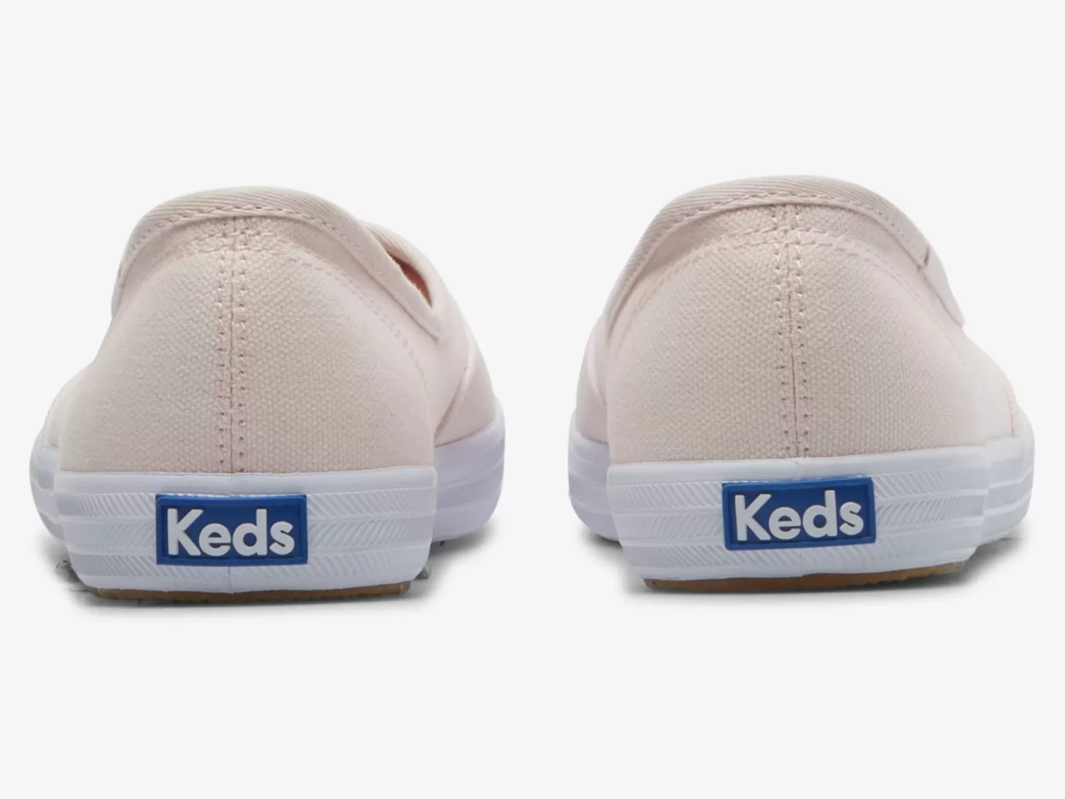 Keds Slip Ons>Women's The Mini Canvas Slip On Sneaker Light Pink